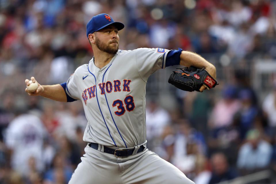 New York Mets starting pitcher Tylor Megill pitches during the first inning of a baseball game against the Atlanta Braves, Tuesday, Aug. 22, 2023, in Atlanta. (AP Photo/Butch Dill)