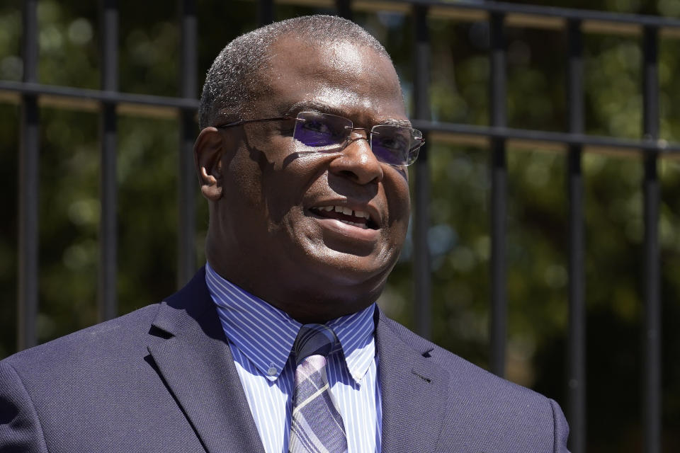 Michael Cox, who has been named as the next Boston police commissioner, faces reporters during a news conference, Wednesday, July 13, 2022, in Boston's Roxbury neighborhood. Cox, who was beaten more than 25 years ago by colleagues who mistook him for a suspect in a fatal shooting, served in multiple roles with the Boston Police Department before becoming the police chief in Ann Arbor, Michigan, in 2019. (AP Photo/Steven Senne)