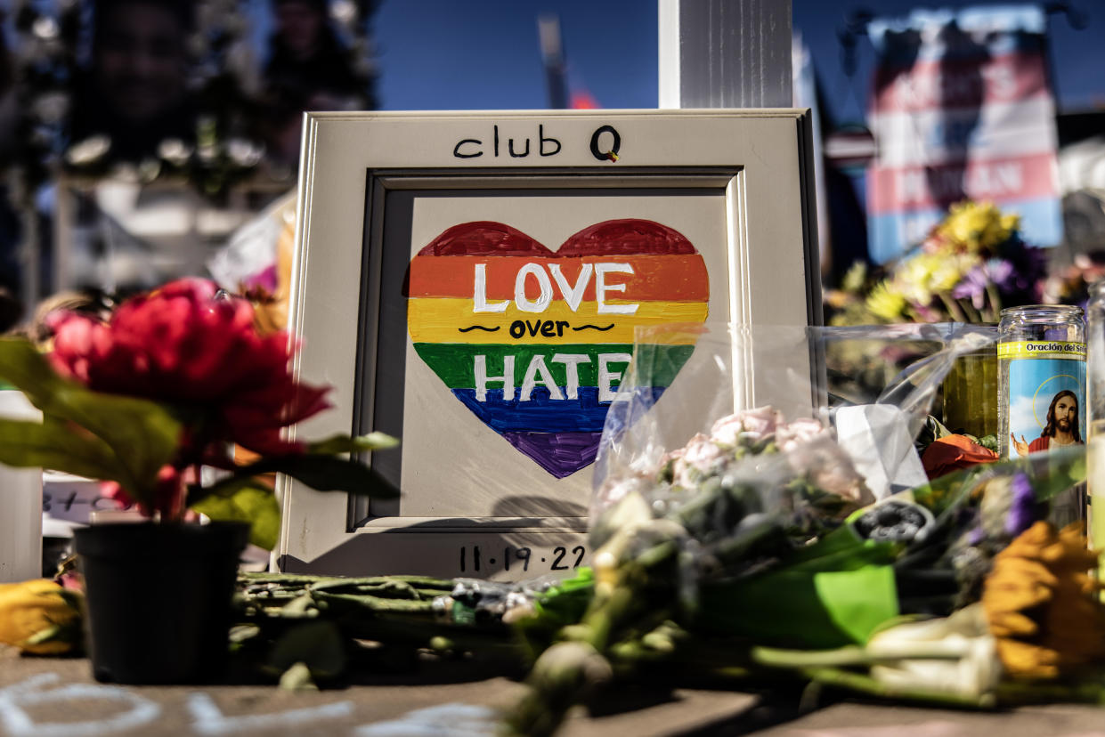 Mourners at a memorial outside of Club Q on November 22, 2022 in Colorado Springs, Colorado. A gunman opened fire inside the LGBTQ+ club on November 19th, killing 5 and injuring 25 others. / Credit: Chet Strange / Getty Images