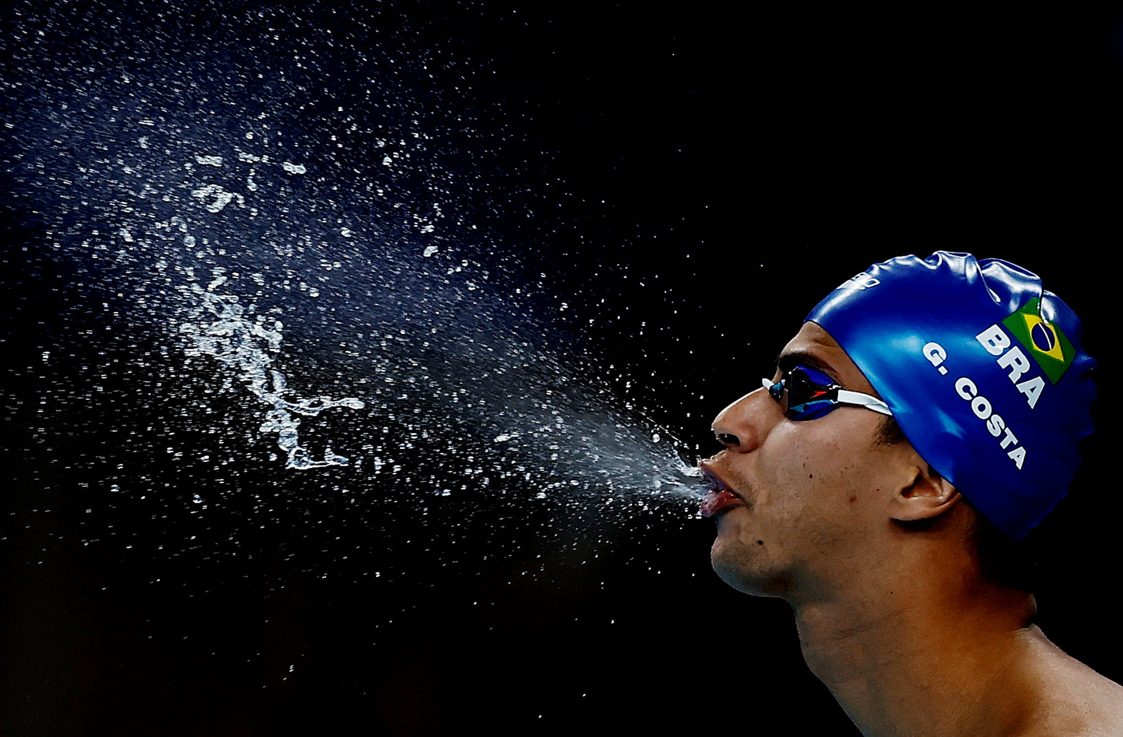 Guilherme Costa of Brazil exhales water ahead of the men's 800m freestyle swimming heat.