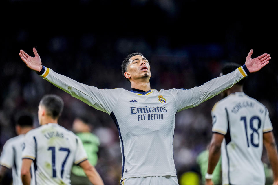 Real Madrid's Jude Bellingham celebrates after scoring his side's third goal during a Spanish La Liga soccer match between Real Madrid and Girona at the Santiago Bernabeu stadium in Madrid, Spain, Saturday, Feb. 10, 2024. (AP Photo/Manu Fernandez)