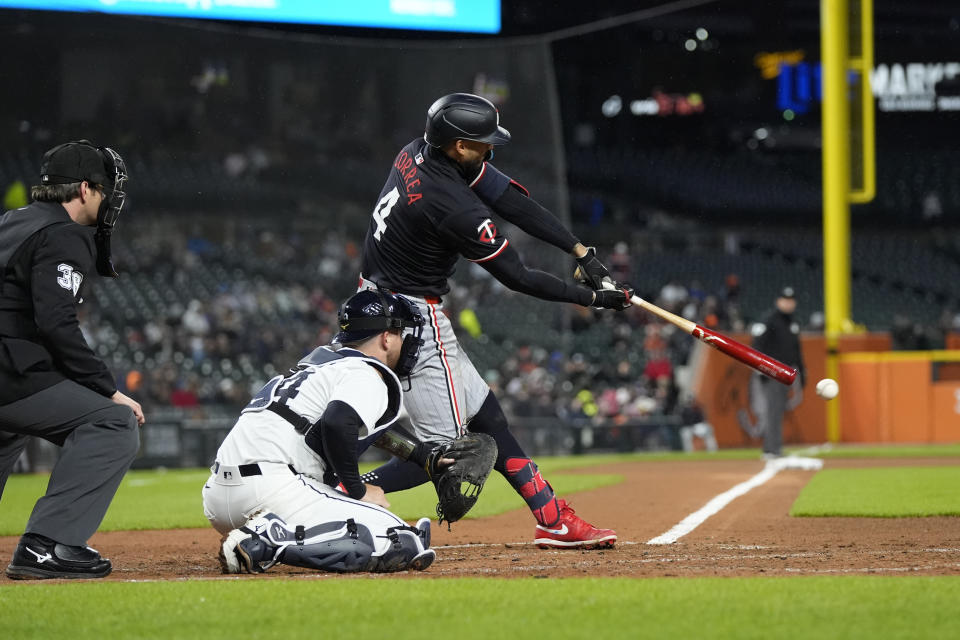 Minnesota Twins' Carlos Correa takes a strike during the third inning of a baseball game against the Detroit Tigers, Friday, April 12, 2024, in Detroit. (AP Photo/Carlos Osorio)