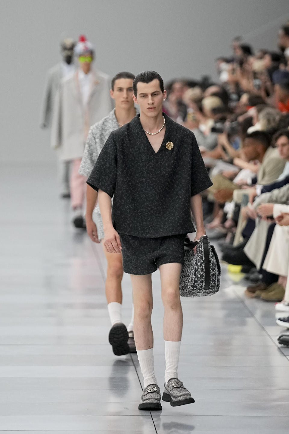 A model wears a creation for the Dior Menswear Spring/Summer 2024 fashion collection presented in Paris, Friday, June 23, 2023. (AP Photo/Michel Euler)