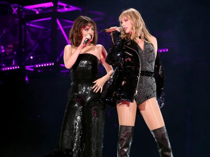 Selena Gomez and Taylor Swift perform on the Reputation Tour in 2018.