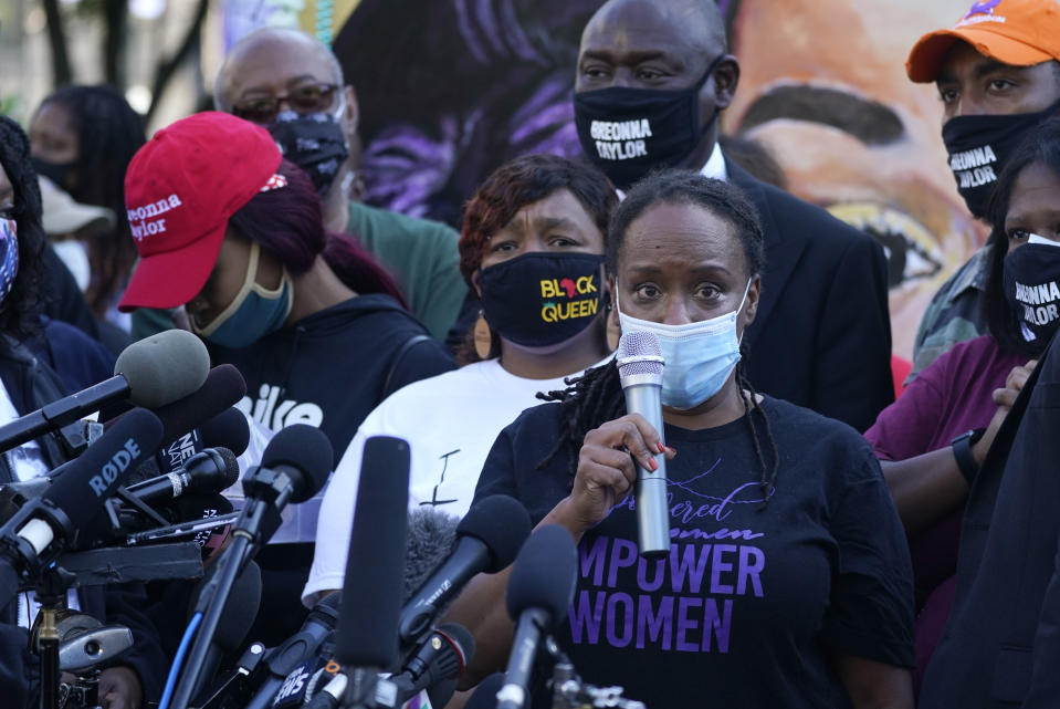 State Rep. Attica Scott speaks during a news conference, Friday, Sept. 25, 2020, in Louisville, Ky. Breonna Taylor's family attorney Ben Crump is calling for the Kentucky attorney general to release the transcripts from the grand jury that decided not to charge any of the officers involved in the Black woman's death. (AP Photo/Darron Cummings)