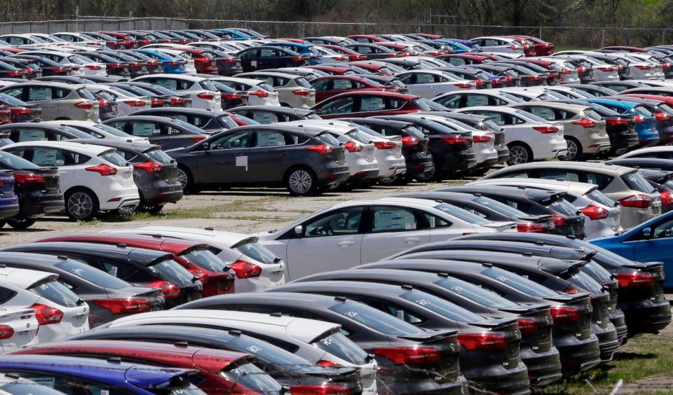 Ford Focus vehicles are seen on a storage lot on Friday, May 1, 2015, in Ypsilanti.