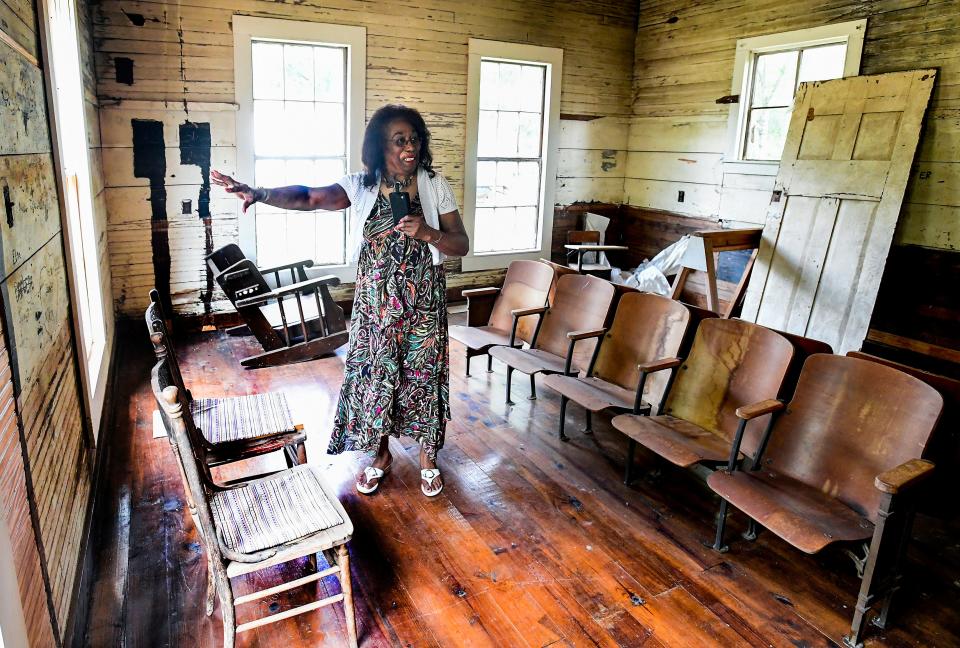 Josephine Bolling McCall discusses the rescue and restoration of the historic Lowndesboro School building in Lowndesboro, Ala., on Tuesday.