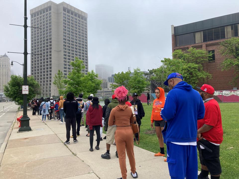 Tax filers stand in line on Michigan Avenue at 9:12 a.m. Saturday May 18 for walk-in help at IRS offices at the Patrick V. McNamara Federal Building in Detroit. Many said they were told by the IRS or their tax preparers that they needed to verify their IDs in person.