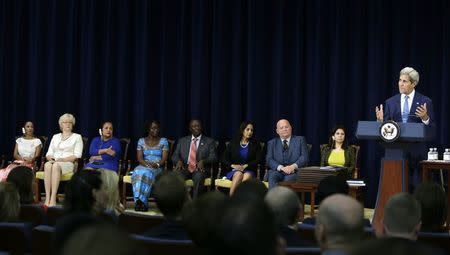 United States Secretary of State John Kerry (R) hosts a State Department ceremony to release "The 2015 Trafficking in Persons Report" in Washington July 27, 2015. REUTERS/Gary Cameron