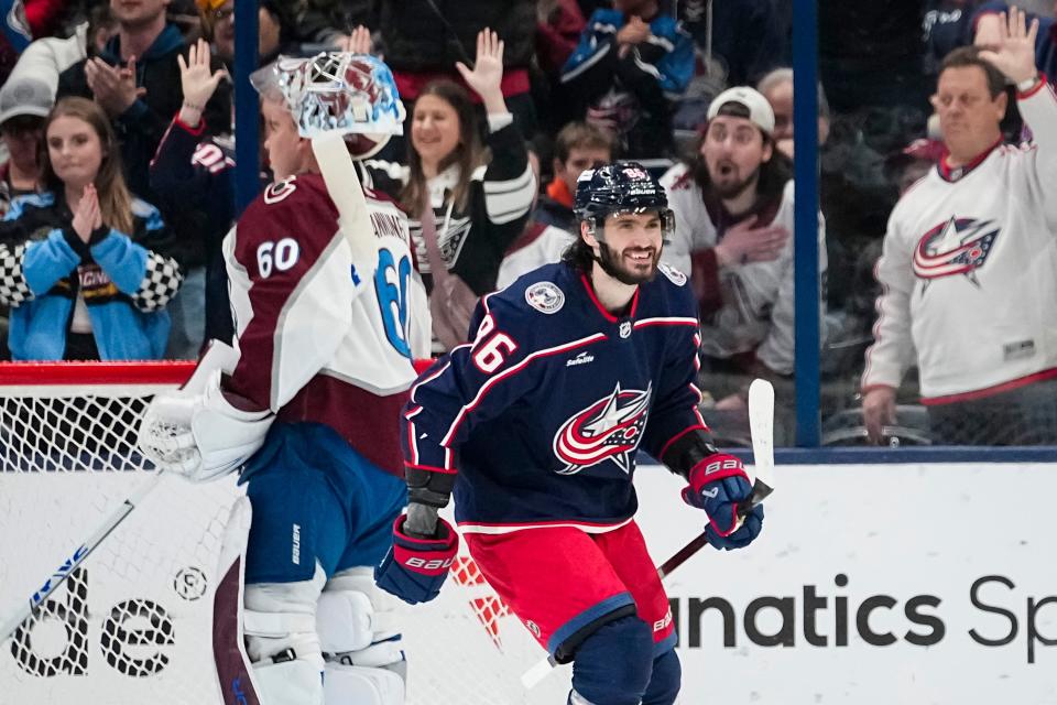 Apr 1, 2024; Columbus, Ohio, USA; Columbus Blue Jackets right wing Kirill Marchenko (86) celebrates scoring a goal in front of Colorado Avalanche goaltender Justus Annunen (60) during the second period of the NHL hockey game at Nationwide Arena.