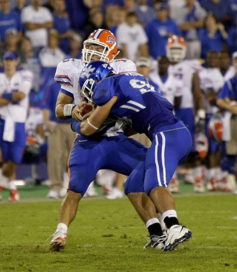 Kentucky’s Taylor Wyndham knocked Tim Tebow out of the teams’ 2009 game in Lexington on a third-quarter sack that sent the Florida QB to the hospital. Mark Cornelison/Herald-Leader File Photo