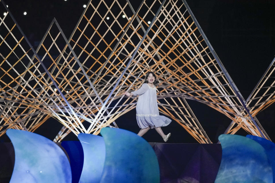 Artist Amanda Ramirez performs during the opening ceremony of the Pan American Games at the National Stadium in Santiago, Chile, Friday, Oct. 20, 2023. (AP Photo/Fernando Vergara)