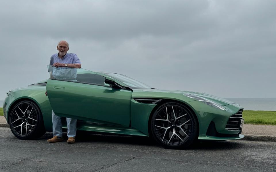 John Roberts with Aston Martin's flagship DB12 tourer