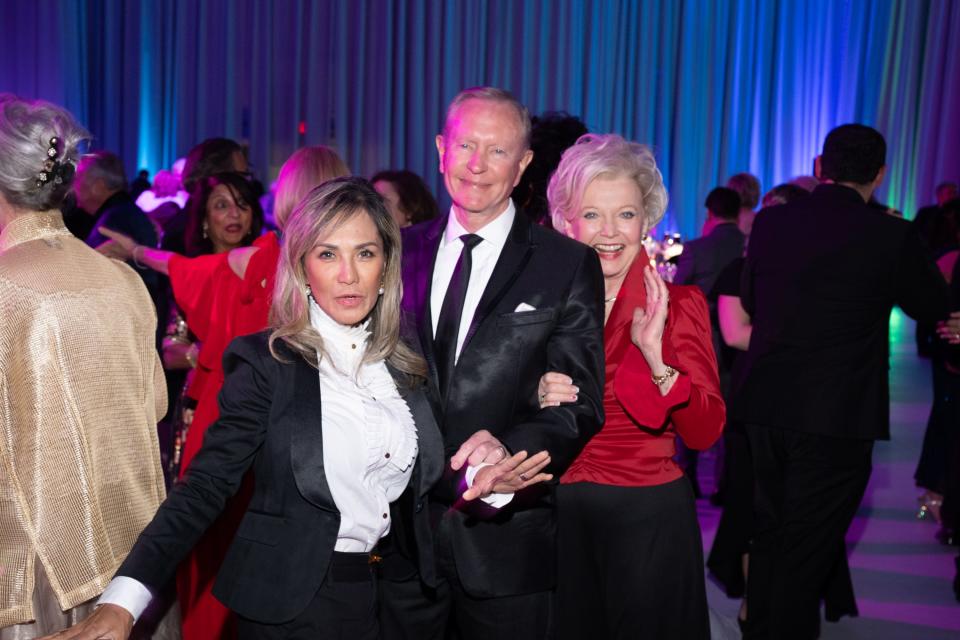 Geri and Walter Clark enjoy the dance floor with Patty Newman at the annual Air Museum Gala in Palm Springs, Calif., on Feb. 10, 2024.