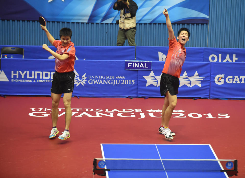 江宏傑黃聖盛一同摘下2015年光州世大運桌球男雙金牌。（大專體總提供）