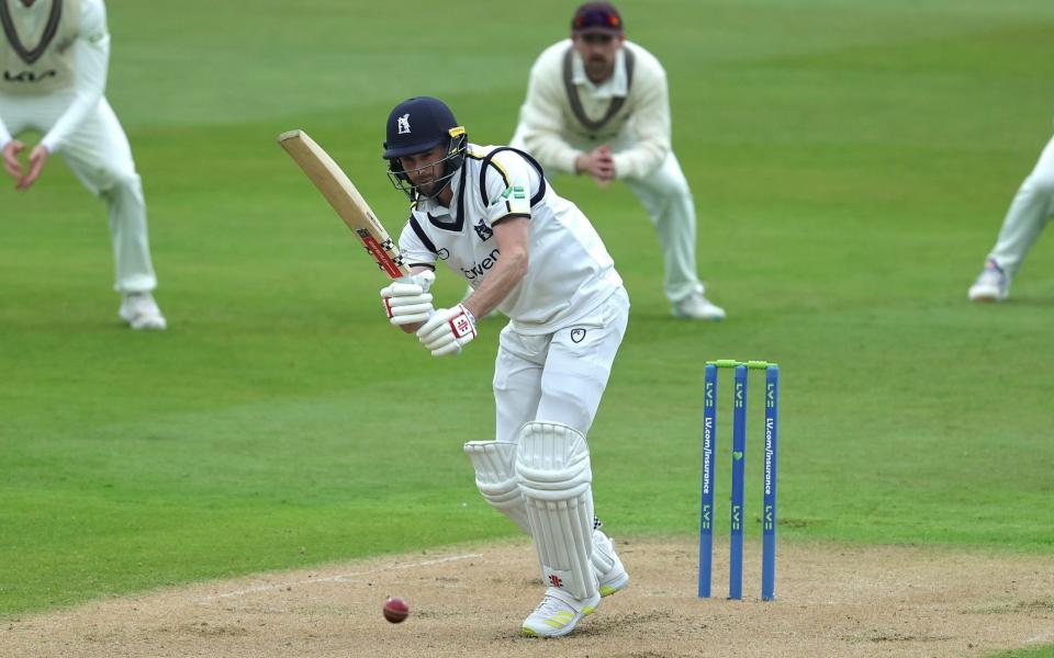 Chris Woakes of Warwickshire drives the ball down the pitch during the LV= Insurance County Championship Division 1 match between Warwickshire and Surrey at Edgbaston on April 27, 2023 in Birmingham - Getty Images/David Rogers