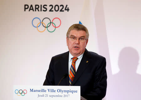 FILE PHOTO: President of the International Olympic Committee (IOC) Thomas Bach attends a press conference during his visit at the future site of the sailing for the 2024 Summer Olympic Games in Marseille, France, September 21, 2017. REUTERS/Sebastien Nogier/Pool