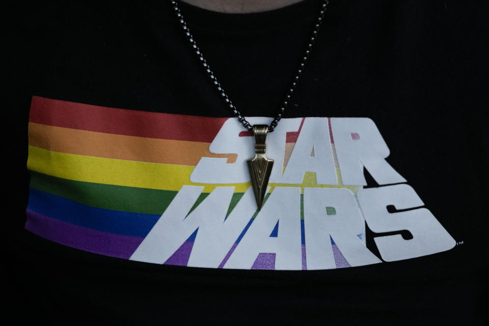 A student of the Jedi Knight Academy wears a Star Wars shirt during a lightsaber practice session at a park in Mexico City, late Saturday, June 15, 2024. The academy is a lightsaber combat and choreography school founded in 2019 and a dream come true for fans of Star Wars. (AP Photo/Eduardo Verdugo)