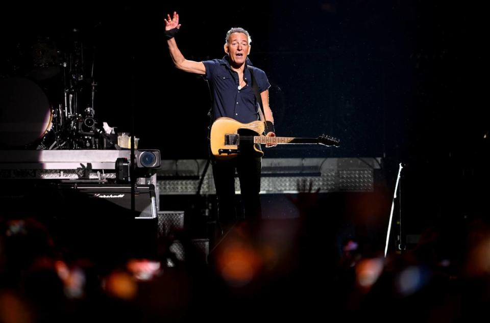 Bruce Springsteen waves to the sold out Bryce Jordan Center crowd as he walks on stage for the show on Saturday, March 18, 2023.