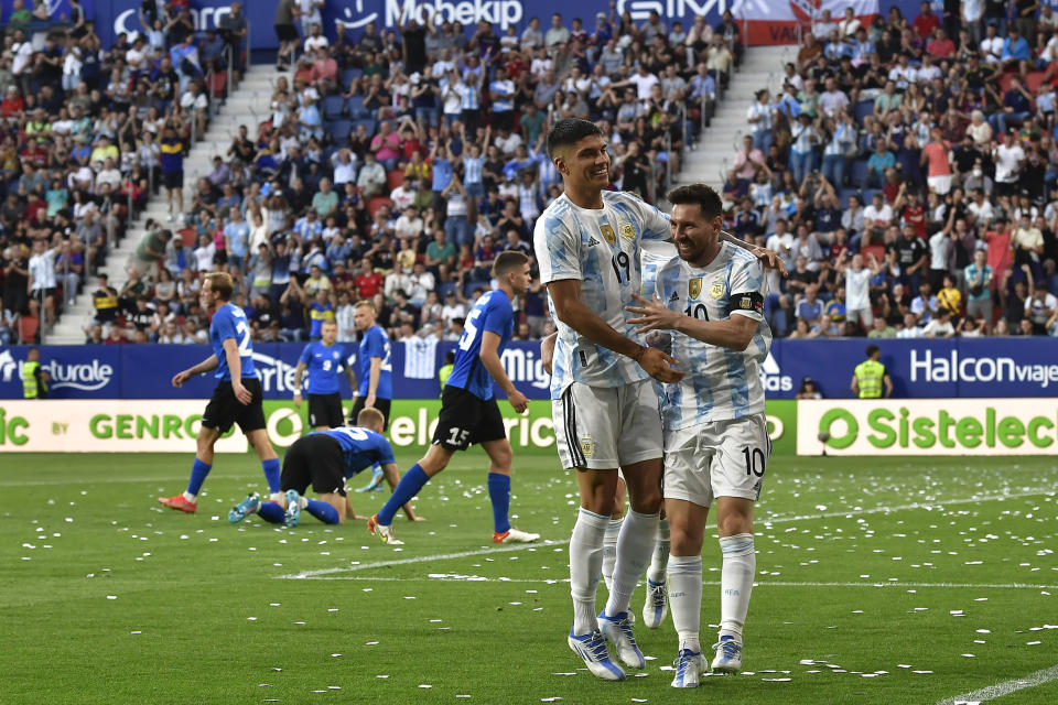 Argentina's Lionel Messi celebrates scoring his sid's third goal during friendly match against Estonia at El Sadar stadium in Pamplona, northern Spain, Sunday, June 5, 2022. (AP Photo/Alvaro Barrientos)