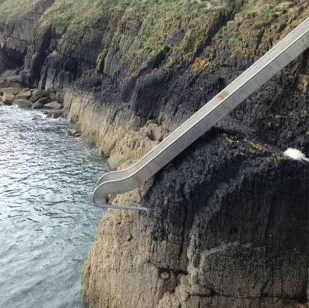 The adventurer installed this slide on his island holiday home. Credit: Twitter@BearGrylls