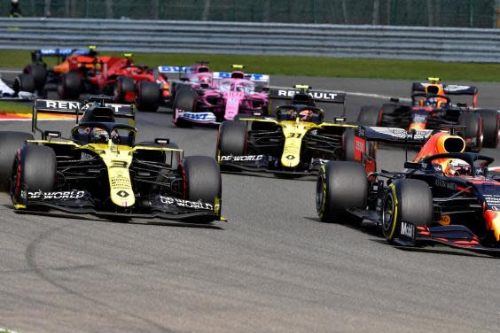 Daniel Ricciardo challenges Max Verstappen on the first lap of the Belgian Grand Prix (AP)