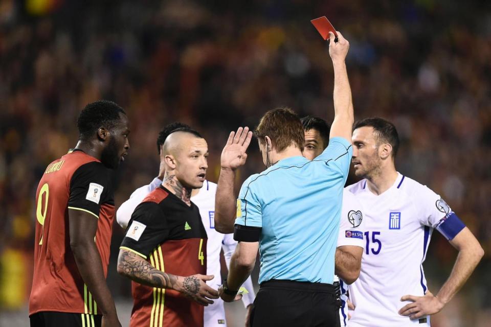 Dismissals | Greece had two men sent off against Belgium (AFP/Getty Images)