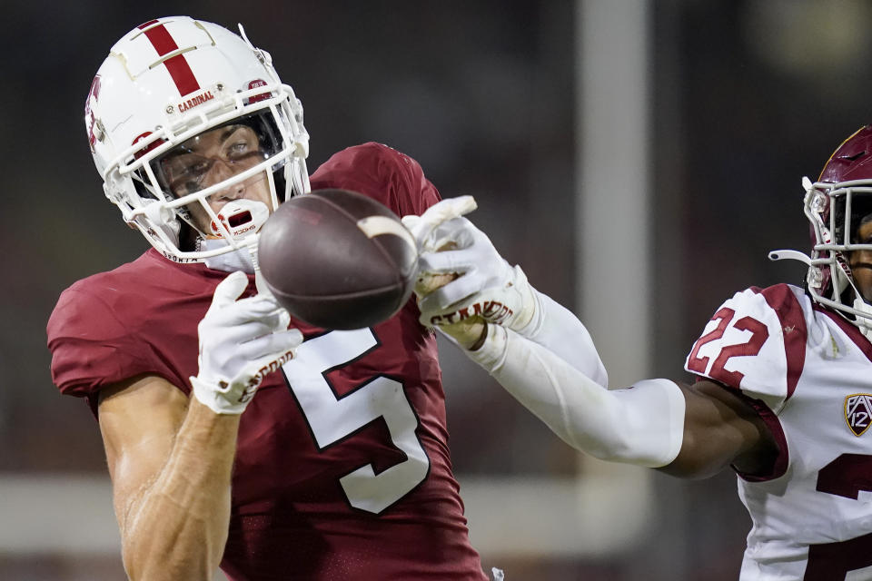 FILE - Stanford wide receiver John Humphreys (5) is unable to catch a pass against Southern California defensive back Ceyair Wright (22), who was called for pass inference on the play, during the second half of an NCAA college football game in Stanford, Calif., Saturday, Sept. 10, 2022. Stanford opens their season at Hawaii on Sept. 1. (AP Photo/Godofredo A. Vásquez, File)