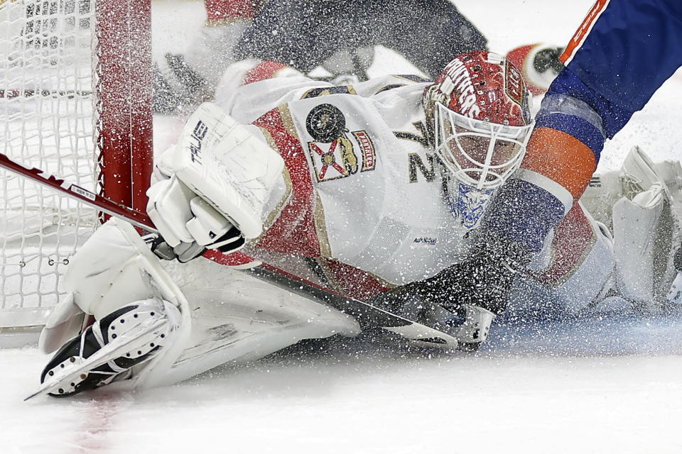 Florida Panthers goaltender Sergei Bobrovsky stops a shot by New York Islanders right wing Nikita Soshnikov during the second period of an NHL hockey game Thursday, Oct. 13, 2022, in Elmont, N.Y. (AP Photo/Adam Hunger)