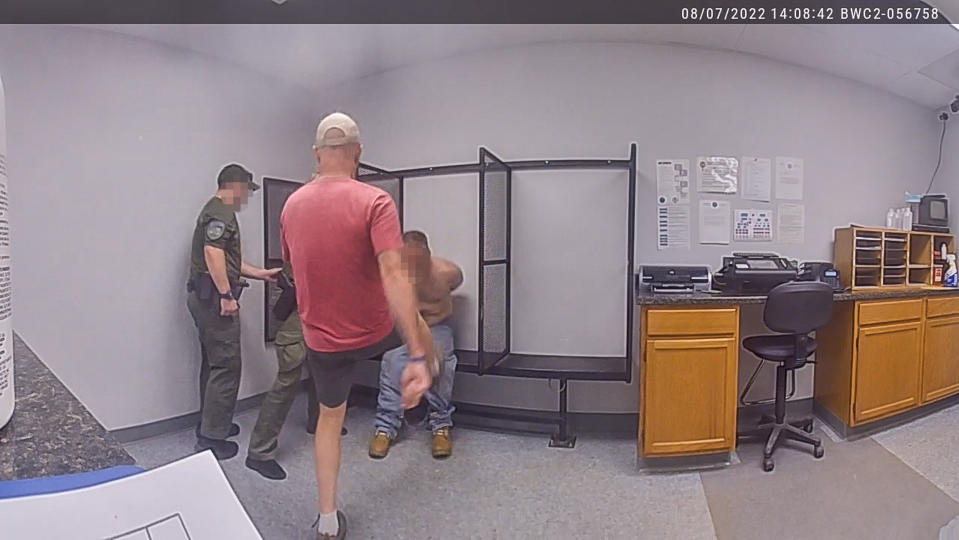 Captain John Grismore kicks a handcuffed man multiple times on Aug. 7, 2022 in Franklin County, Vt. (Franklin County Sheriff's Office)