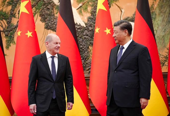 Xi Jinping with Olaf Scholz at the Great Hall of the People in Beijing on Friday. Photo: dpa alt=Xi Jinping with Olaf Scholz at the Great Hall of the People in Beijing on Friday. Photo: dpa>