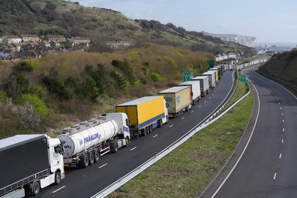 Lorries queue to enter the port of Dover in April  (PA)