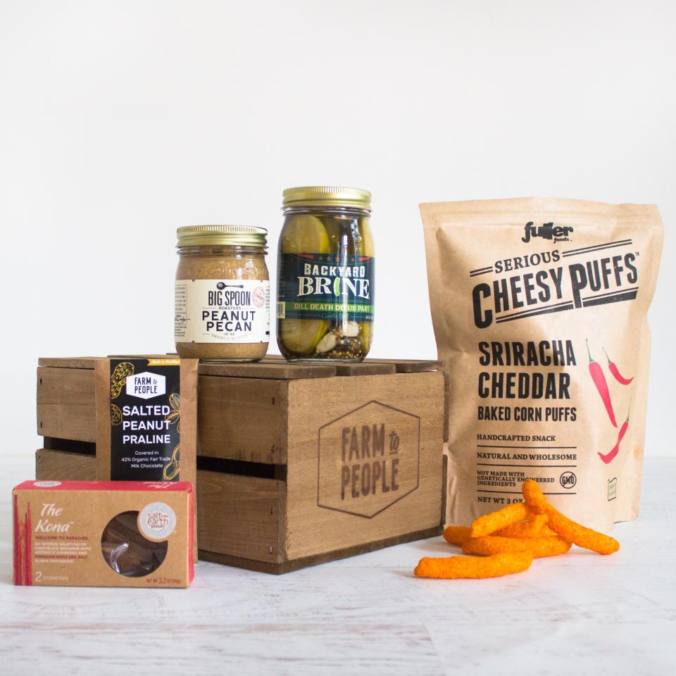 <p>This small-batch food gift set is pretty awesome! Stocked with peanut pecan butter, crispy dill pickles, a chewy chocolate brownie, spicy cheesy puffs, and more, there’s enough here to satisfy mom (and baby’s) uncanny cravings. Pregnancy Cravings in a tote bag, $50, <a rel="nofollow noopener" href="https://www.farmtopeople.com/collections/bundles-gifts/products/pregnancy-cravings" target="_blank" data-ylk="slk:farmtopeople.com.;elm:context_link;itc:0;sec:content-canvas" class="link ">farmtopeople.com.</a> </p>