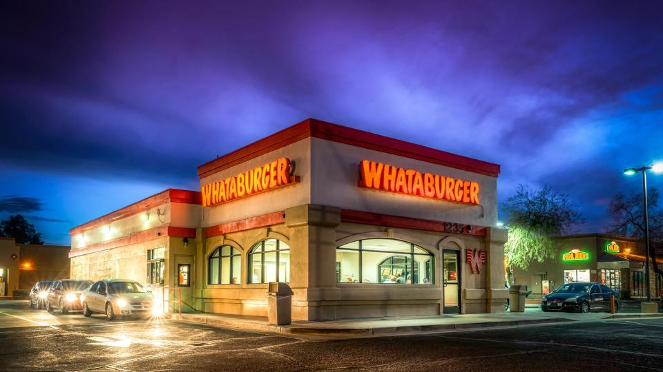 Editorial February 2, 2018: Whataburger fast food restaurant burger fries place Tucson Arizona at night.