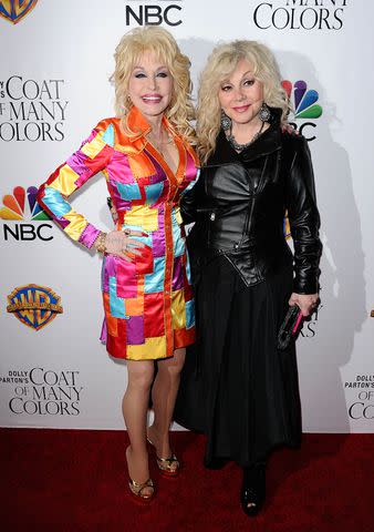 <p>Jason LaVeris/FilmMagic</p> Dolly Parton and Stella Parton attend the premiere of "Dolly Parton's Coat Of Many Colors" at the Egyptian Theatre on December 2, 2015 in Hollywood, California.