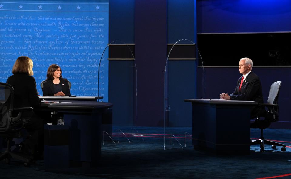 US Vice President Mike Pence Mike Pence (R) and US Democratic vice presidential nominee and Senator from California, Kamala Harris participate in the vice presidential debate in Kingsbury Hall at the University of Utah on October 7, 2020, in Salt Lake City, Utah. (Photo by Robyn Beck / AFP) (Photo by ROBYN BECK/AFP via Getty Images)