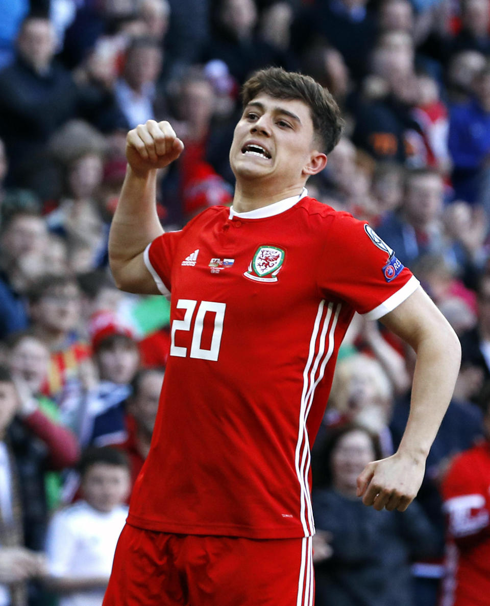 Wales' Daniel James celebrates scoring against Slovakia during the Euro 2020 qualifying, Group E soccer match at the Cardiff City Stadium, Wales, Sunday March 24, 2019. (Darren Staples/PA via AP)