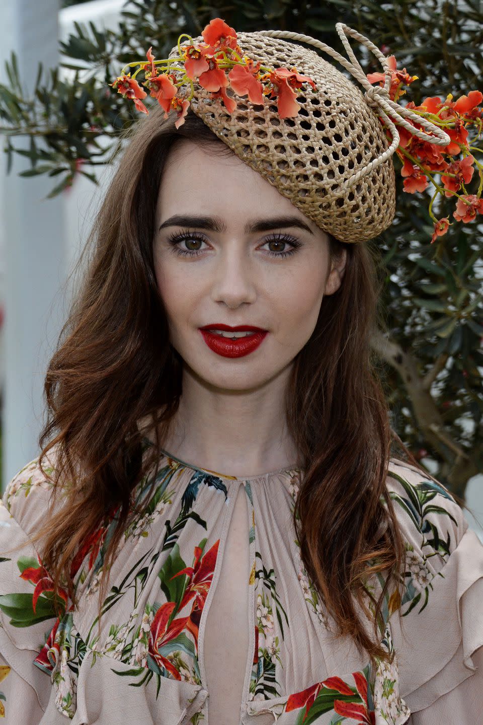 <p>With Ascot starting this week, Lily Collins provided faultless make-up inspiration for the races, with her long lashes, flawless skin and bold red lipstick. You can follow her example by using Nars' <a rel="nofollow noopener" href="https://www.spacenk.com/uk/en_GB/makeup/complexion/tinted-moisturiser/pure-radiant-tinted-moisturiser-UK200008447.html?gclid=CjwKCAjwsJ3ZBRBJEiwAtuvtlKAhnFSkrdQrW50Y2gmoNs6k45-Ua-oS4CZCDJ0nIHKdZIJ1PnQ7GhoCzvAQAvD_BwE&gclsrc=aw.ds" target="_blank" data-ylk="slk:Pure Radiant Tinted Moisturiser;elm:context_link;itc:0;sec:content-canvas" class="link ">Pure Radiant Tinted Moisturiser</a>, £30, instead of heavy foundation, Glossier's <a rel="nofollow noopener" href="https://www.glossier.com/products/lash-slick?locale=en-GB&gclid=CjwKCAjwsJ3ZBRBJEiwAtuvtlLcGWEG1PiniQ1fGE8TJv6-G6DuTBrsKCzo775yanfXN1YdOYWD8TRoCCogQAvD_BwE" target="_blank" data-ylk="slk:Mascara;elm:context_link;itc:0;sec:content-canvas" class="link ">Mascara</a>, £14, to define your eyes and Lancôme’s <a rel="nofollow noopener" href="https://www.lancome.co.uk/makeup/lips/lipstick/labsolu-rouge-matte/3614271386076.html" target="_blank" data-ylk="slk:L’Absolu Rouge Matte in Isabella;elm:context_link;itc:0;sec:content-canvas" class="link ">L’Absolu Rouge Matte in Isabella</a>, £25.50, as the perfect accompaniment to a floral fascinator.</p>