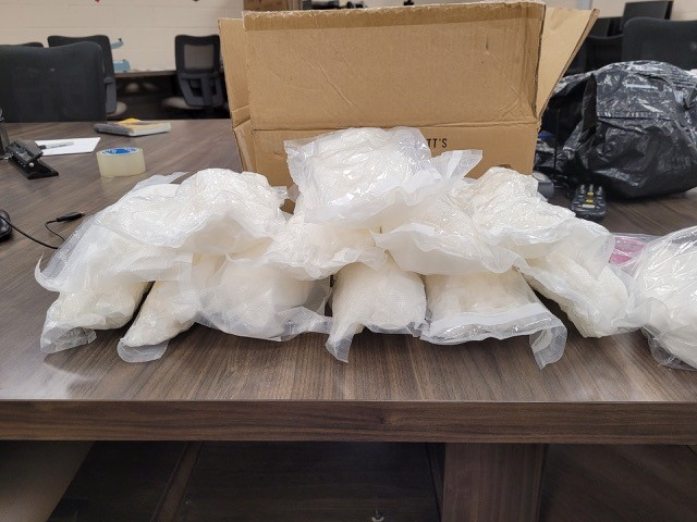 A state Trooper found multiple vacuum-sealed bundles of methamphetamine and one plastic-wrapped bundle of cocaine inside a cardboard box in the trunk of a vehicle that had been pulled over Sunday morning in Oldham County.