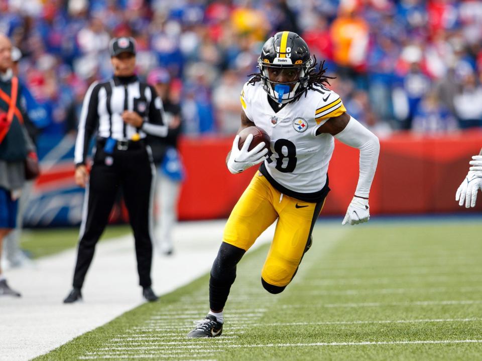 Diontae Johnson runs after a catch against the Buffalo Bills.