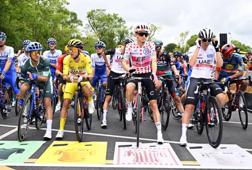 British Simon Yates of Team Jayco Alula  British Adam Yates of UAE Team Emirates US Neilson Powless of EF EducationEasyPost and Slovenian Tadej Pogacar of UAE Team Emirates pictured at the start of the second stage of the Tour de France cycling race a 2089 km race from VitoriaGasteiz to San Sebastian Spain Sunday 02 July 2023 This years Tour de France takes place from 01 to 23 July 2023 BELGA PHOTO JASPER JACOBS Photo by JASPER JACOBS  BELGA MAG  Belga via AFP Photo by JASPER JACOBSBELGA MAGAFP via Getty Images