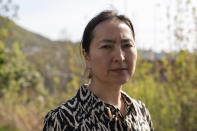 Uyghur Mihrigul Musa poses for a photo in her yard in Bergen, Norway, on May 8, 2022. Data leaked to The Associated Press shows that in a single county in the Uyghur heartland of China, the imprisonment rate is by far the highest known in the world, over 30 times higher than the rest of China. (AP Photo/Paul Johannessen)