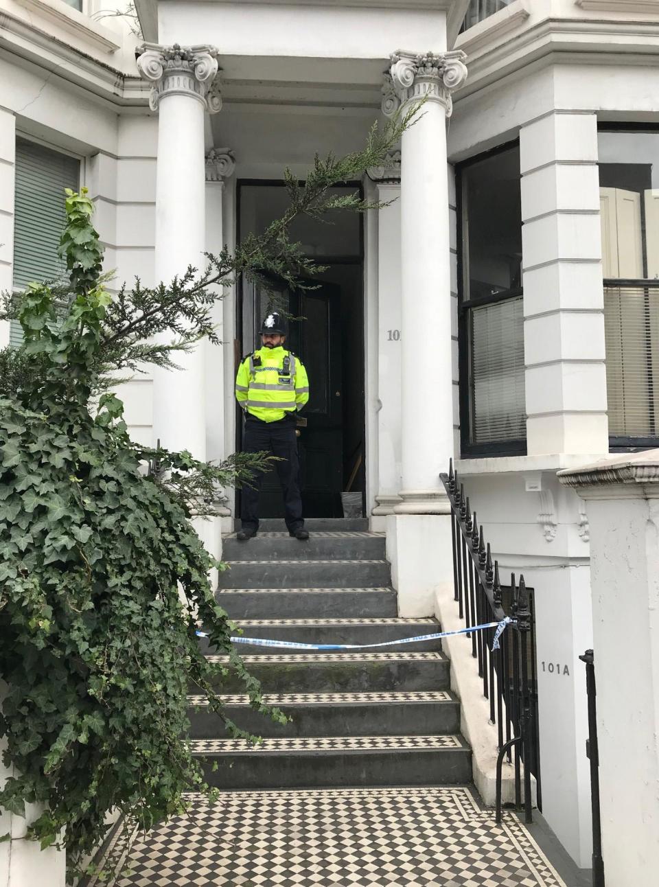 A police officer outside a house in Earl's Court Road after Mr Blackman was stabbed to death (Ryan Hooper/PA)