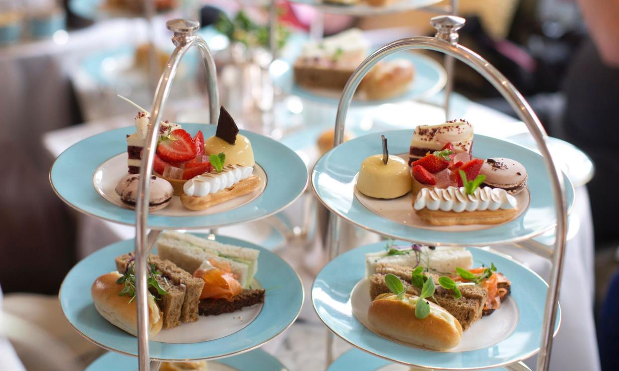 <span>Afternoon tea is served at the Kensington Hotel in London.</span><span>Photograph: Justin Tallis/AFP/Getty Images</span>