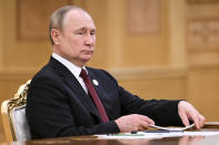 Russian President Vladimir Putin attends a meeting on the sidelines of the Caspian Sea littoral states summit in Ashgabat, Turkmenistan, Wednesday, June 29, 2022. (Grigory Sysoyev, Sputnik, Kremlin Pool Photo via AP)