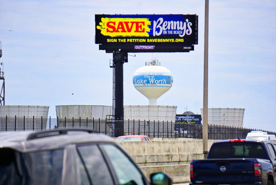 A "Save Benny's on the Beach" billboard appeared over I-95 after the city commission voted down a lease renewal for the historic Lake Worth Beach restaurant.