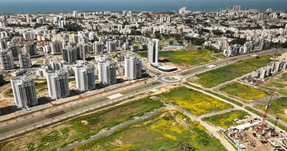 The excavation area with the coastline in the background.