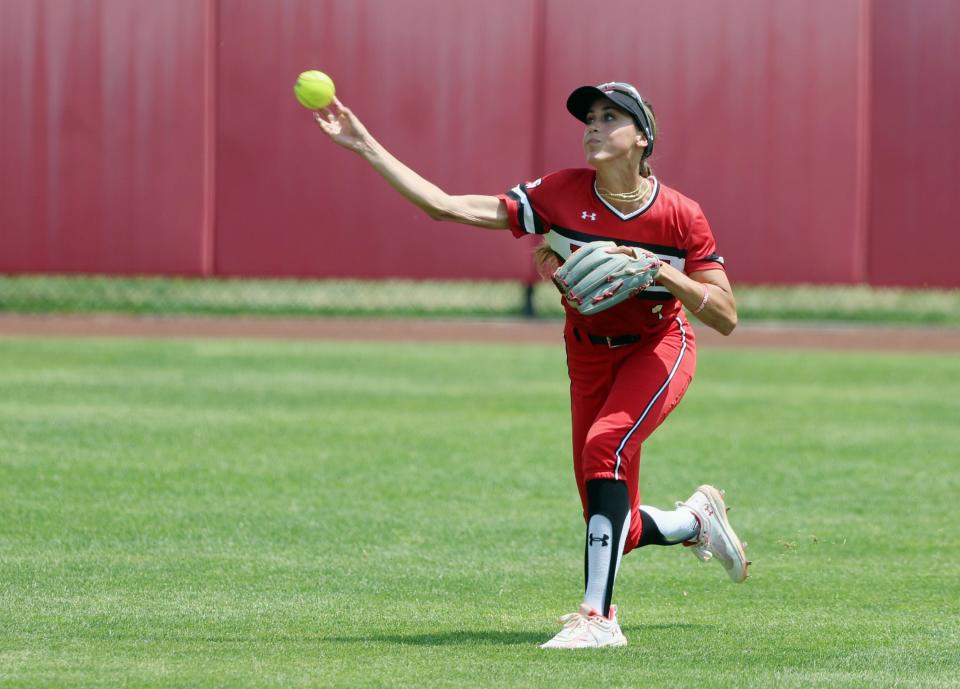 Utah’s Shelbi Ortiz, fires a throw to third base stopping the runner at second after catching the ball off a bounce in the outfield as the University of Utah softball team plays Ole Miss in NCAA softball regional championship at Utah in Salt Lake City on Sunday, May 21, 2023. Utah won 4-1. | Scott G Winterton, Deseret News