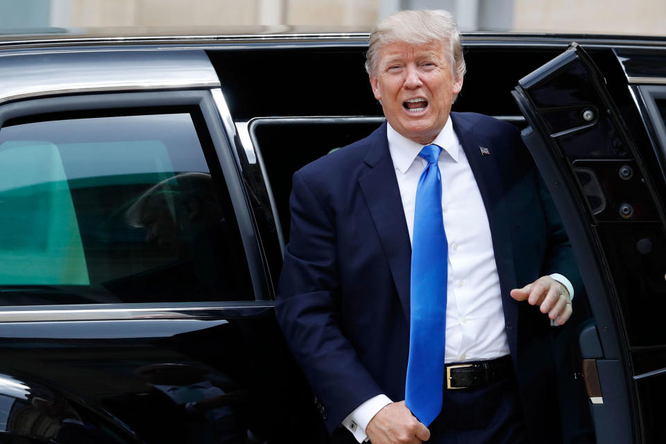 <p>President Donald Trump gets out of the car as he arrives at the Elysee Palace on July 13, 2017 in Paris. (Photo: Patrick Kovarik/AFP/Getty Images) </p>