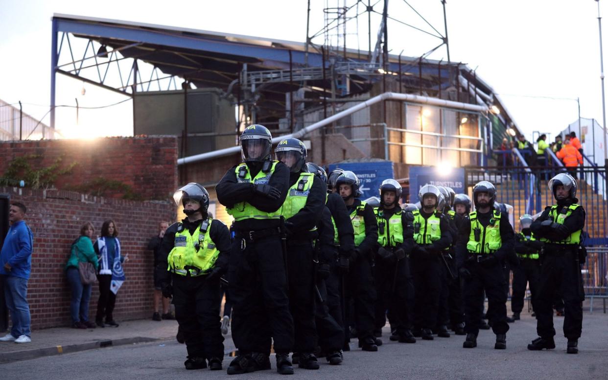 Police presence outside Fratton Park on Tuesday night  - PA